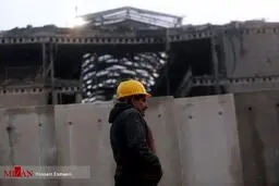 دیوارکشی مقابل محل حادثه ساختمان پلاسکو/تصاویر