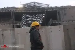 دیوارکشی مقابل محل حادثه ساختمان پلاسکو/تصاویر