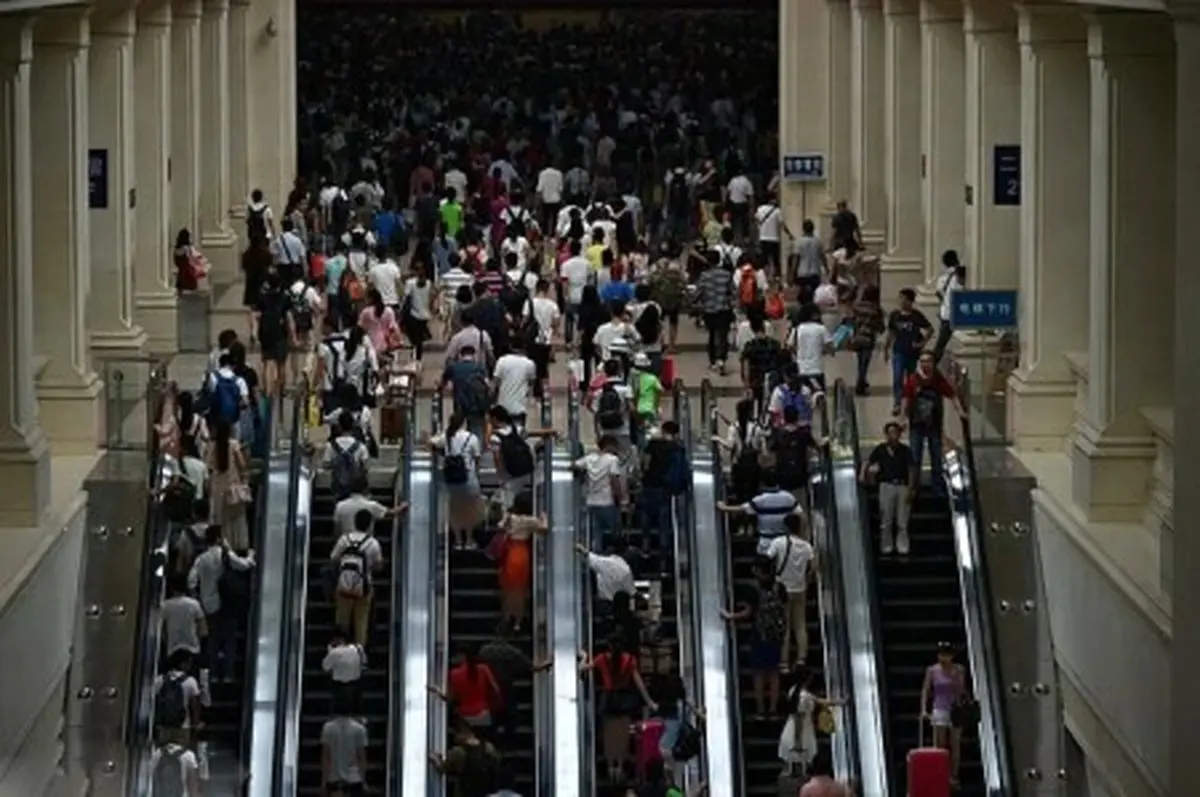 تصاویری از زندگی مردم در خیابان های شلوغ و پر ترافیک چین