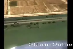گزارش علی ضیا مجری تلویزیونی از داخل بالگرد بر فراز خوزستان