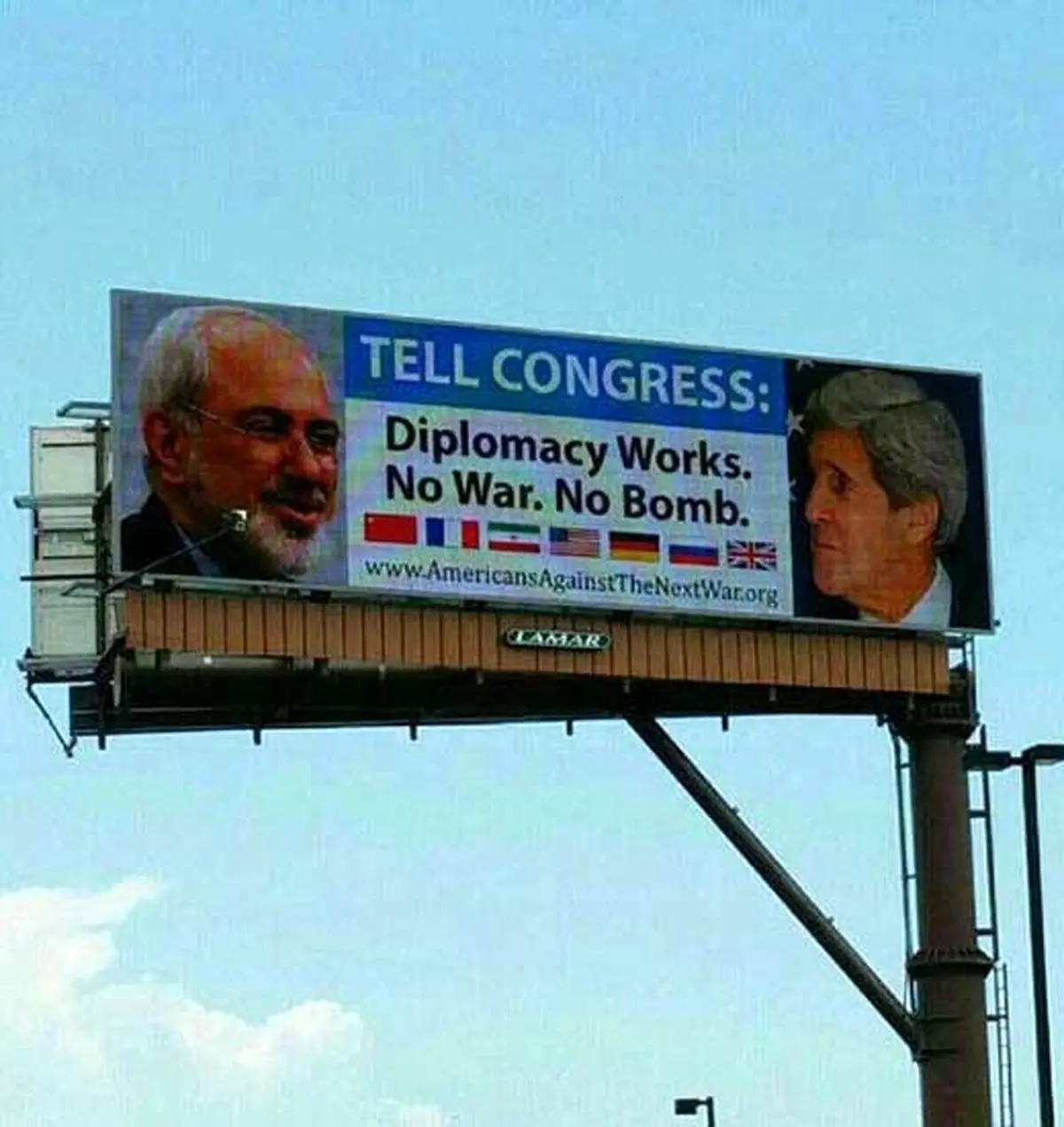 این تصویر واقعی است؟ بیلبورد حمایت از توافق هسته‌ای در نیوجرسی با عکس ظریف چند