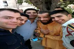 عکس یادگاری با تتلو در مقابل دادگاه!