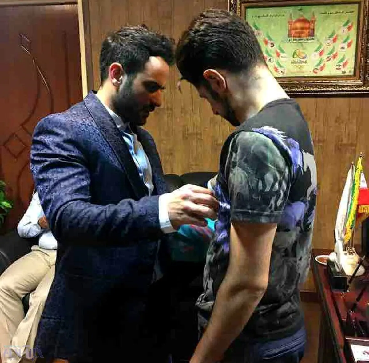 آغاز اندازه‌گیری برای دوخت طرح جدید لباس کاروان ایران در المپیک/تصویر