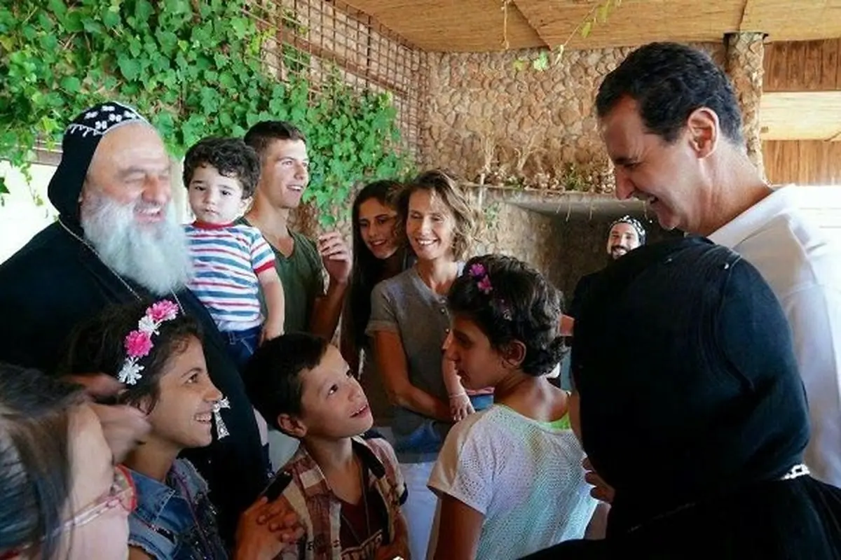 تصاویری از بازدید بشار اسد و خانواده‌اش از یک‌کلیسا در دمشق