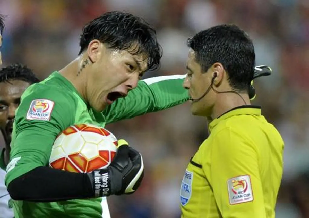 اعتراض شديد دروازه‌بان چين به فغاني (عکس)