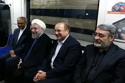 تصویری از لبخند روحانی و رقیب انتخاباتی اش