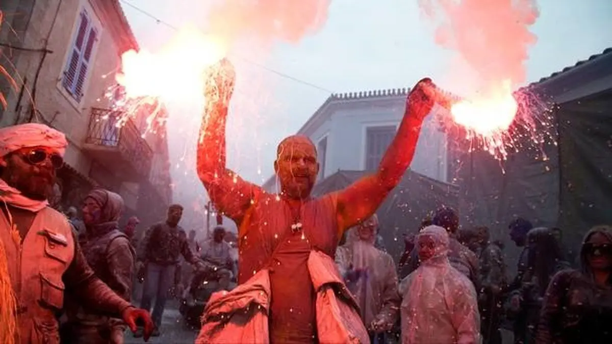 تصاویری از جشنواره پودرهای رنگی در یونان‎