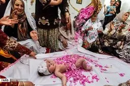 تصاویر: آیین گل‌غلتان نوزادان در امیریه