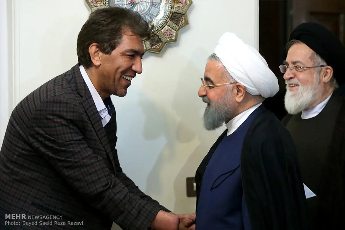 تصاویری از دیدار رییس جمهور روحانی با جانباز دفاع مقدس