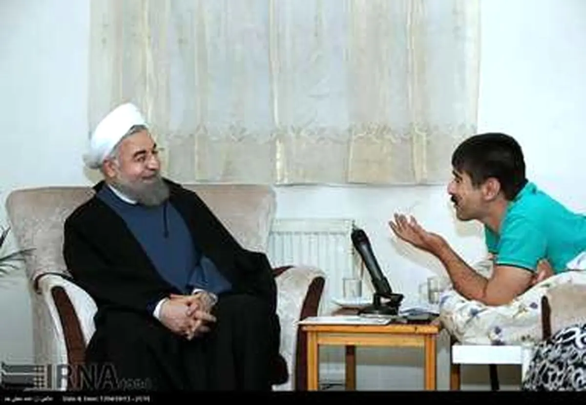دیدار روحانی با جانباز 70 درصد/تصاویر
