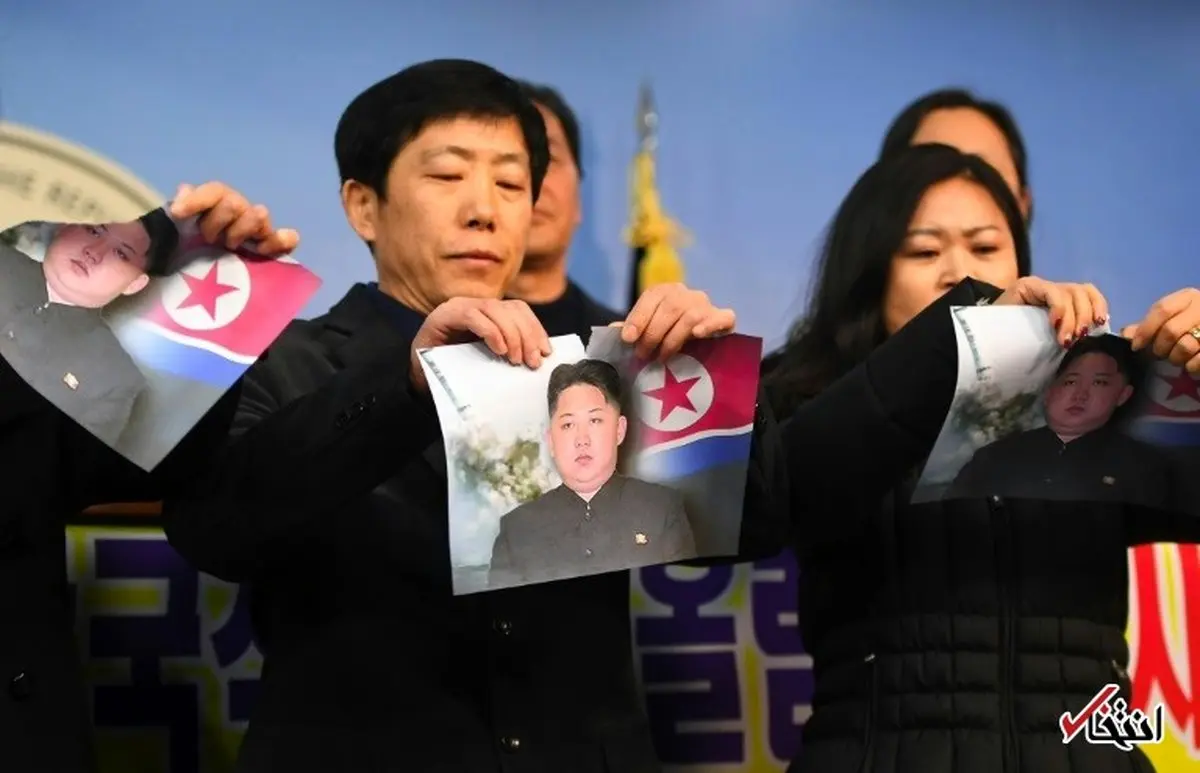 تصویری از پاره کردن عکس رهبر جنجالی کره شمالی در سئول