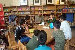 داستان خواني مصطفي رحماندوست براي كودكان كار دركتابخانه ملي/عکس