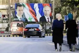 پوتین و بشار اسد بر یک بیلبورد/عکس