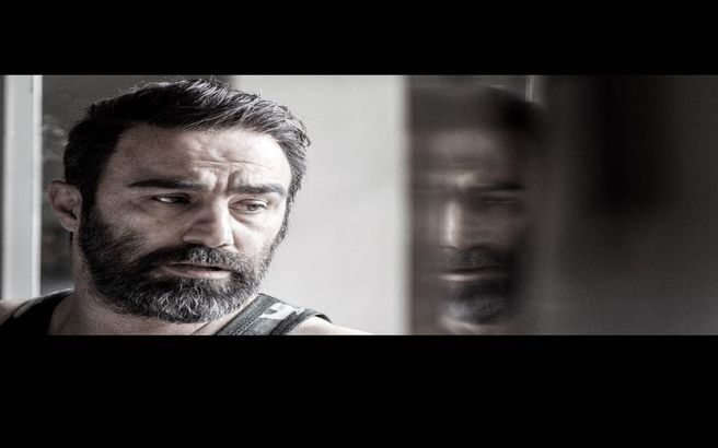 محسن تنابنده در نمایی از فیلم حاضر در جشنواره