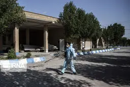 خاک‌سپاری فوتی‌های کرونا در آرامستان اهواز+عکس‌ها