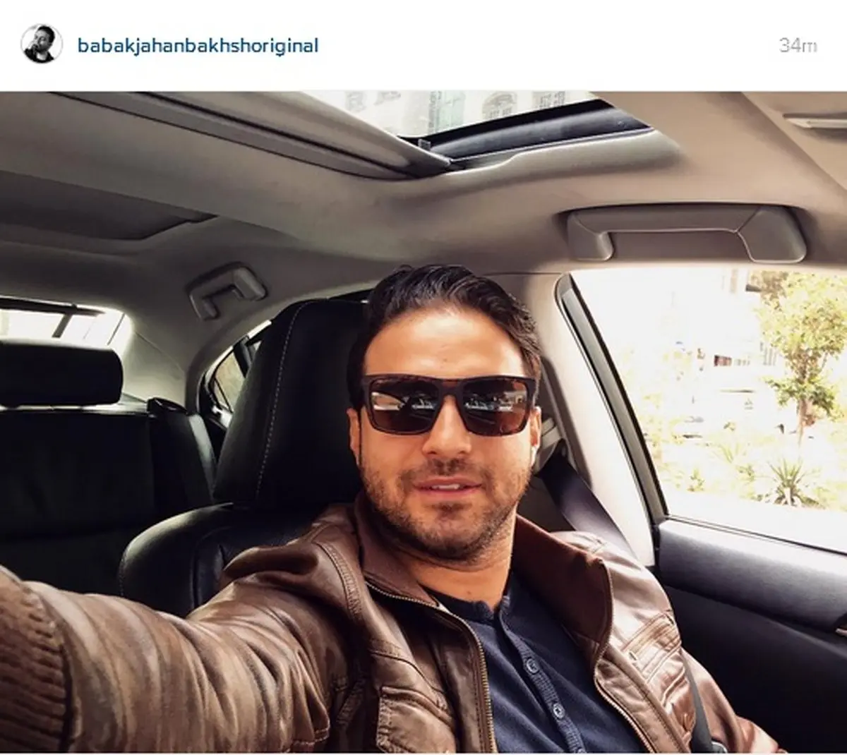 سلفی بابک جهانبخش در خودرو لوکس/ عکس