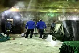 کارکنان در حال آماده کردن محل دفن آیت الله هاشمی /عکس