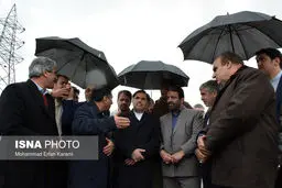 چتری برای وزیر راه و شهرسازی/عکس
