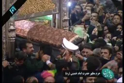 پیکر مطهر آیت‌الله هاشمی وارد ضریح شد/عکس