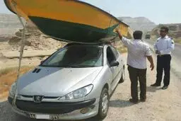 حمل قایق با پژو ۲۰۶/عکس