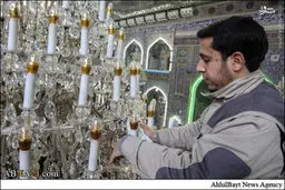 غبار روبی لوسترهای حرم امام حسین (ع) /گزارش تصویری