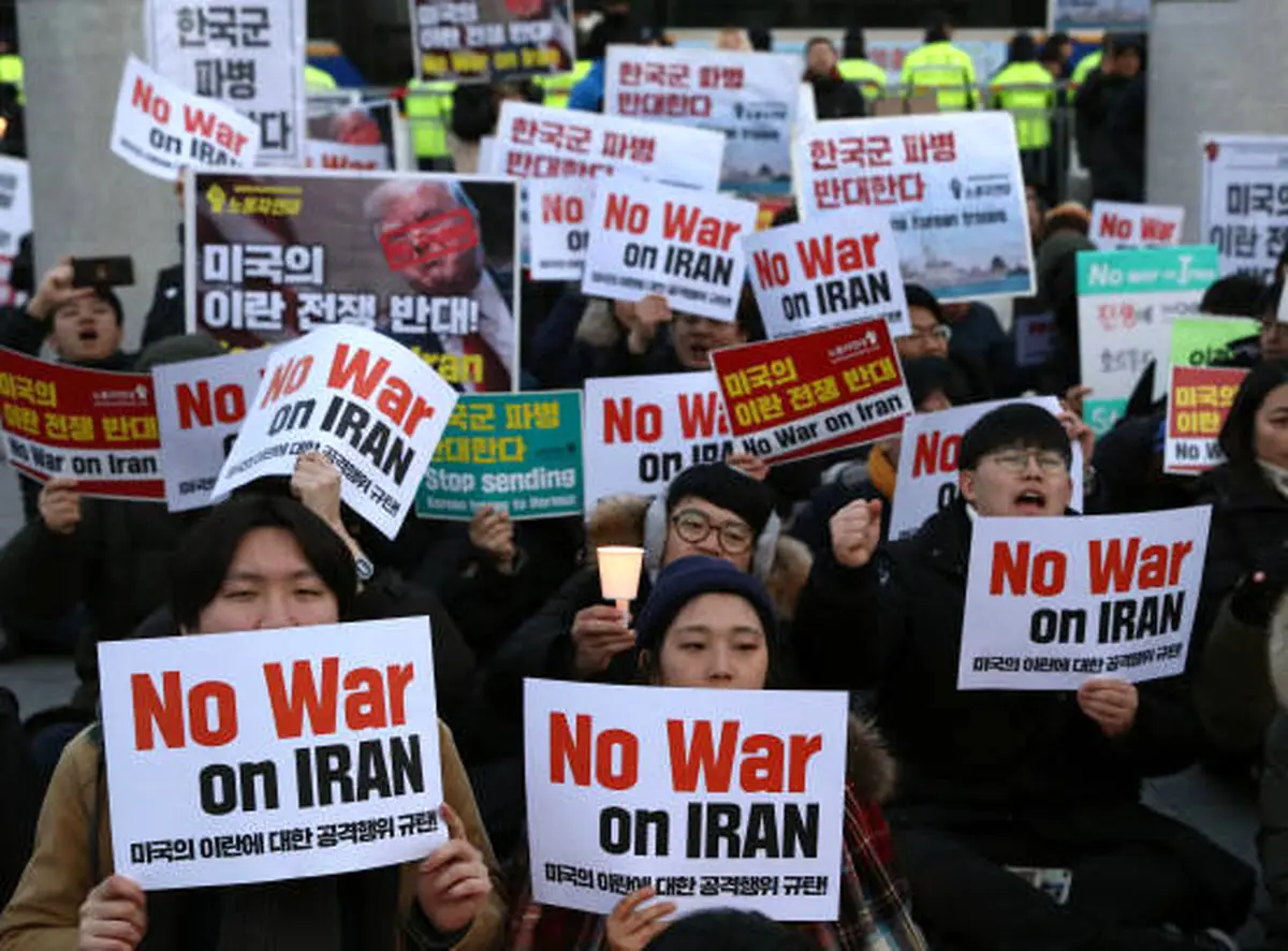 عکس / اعتراض مردم کره جنوبی به تهدیدات ترامپ علیه ایران