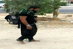 ظاهر متفاوت و عجیب یک زائر در پیاده‌روی اربعین /عکس