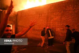 تصاوریری از وقوع آتش سوزی در جوار هیات عزاداری (قم)