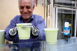 آبمیوه فروشی با دستان آهنی /تصاویر