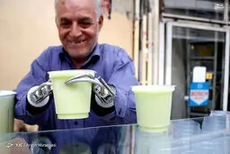 آبمیوه فروشی با دستان آهنی /تصاویر