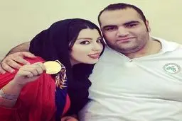 بهداد سلیمی پس از قهرمانی آسیا، در کنار مدال طلا و همسرش