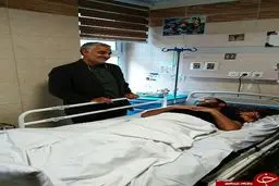 سردار سلیمانی بر بالین یک جانباز /عکس