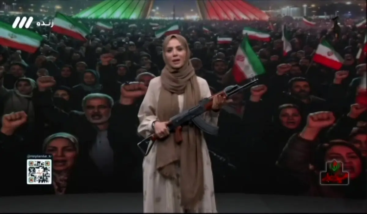 آموزش تیراندازی در تلویزیون با شلیک مجری به پرچم امارات