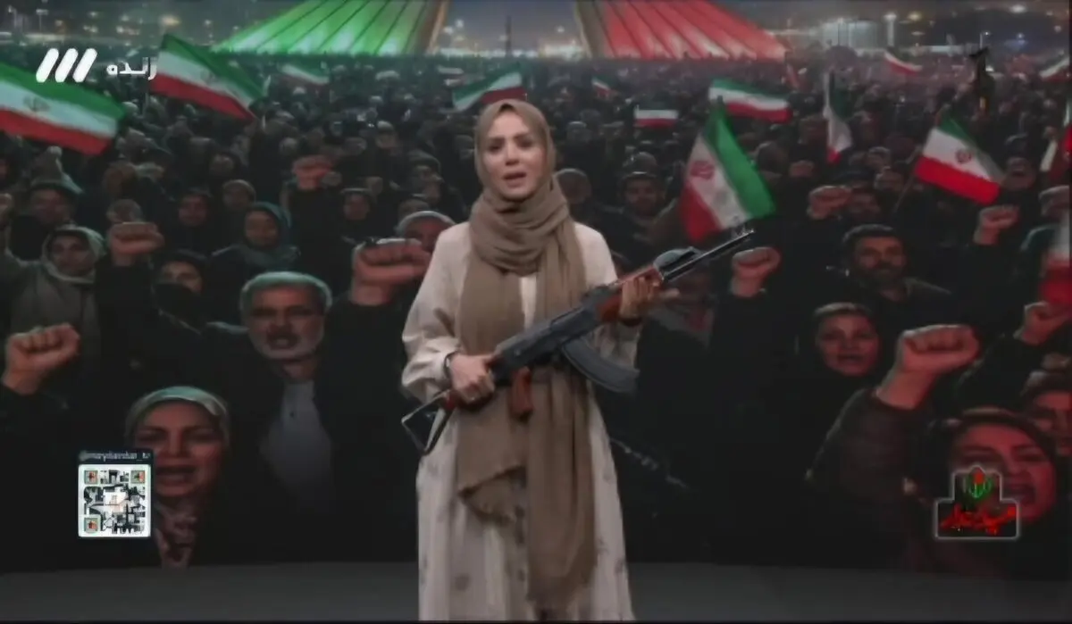 آموزش تیراندازی در تلویزیون با شلیک مجری به پرچم امارات