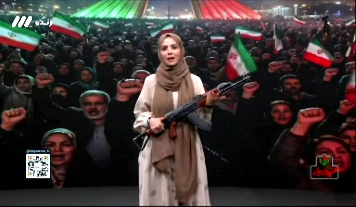 آموزش تیراندازی در تلویزیون با شلیک مجری به پرچم امارات