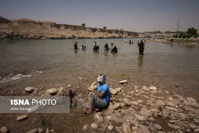 شنا در رودخانه
