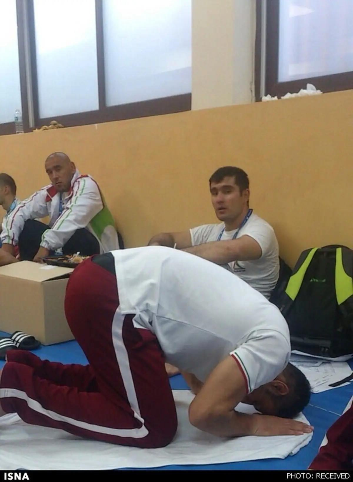 نمازکشتی‌گیرایرانی پیش از فینال/عکس