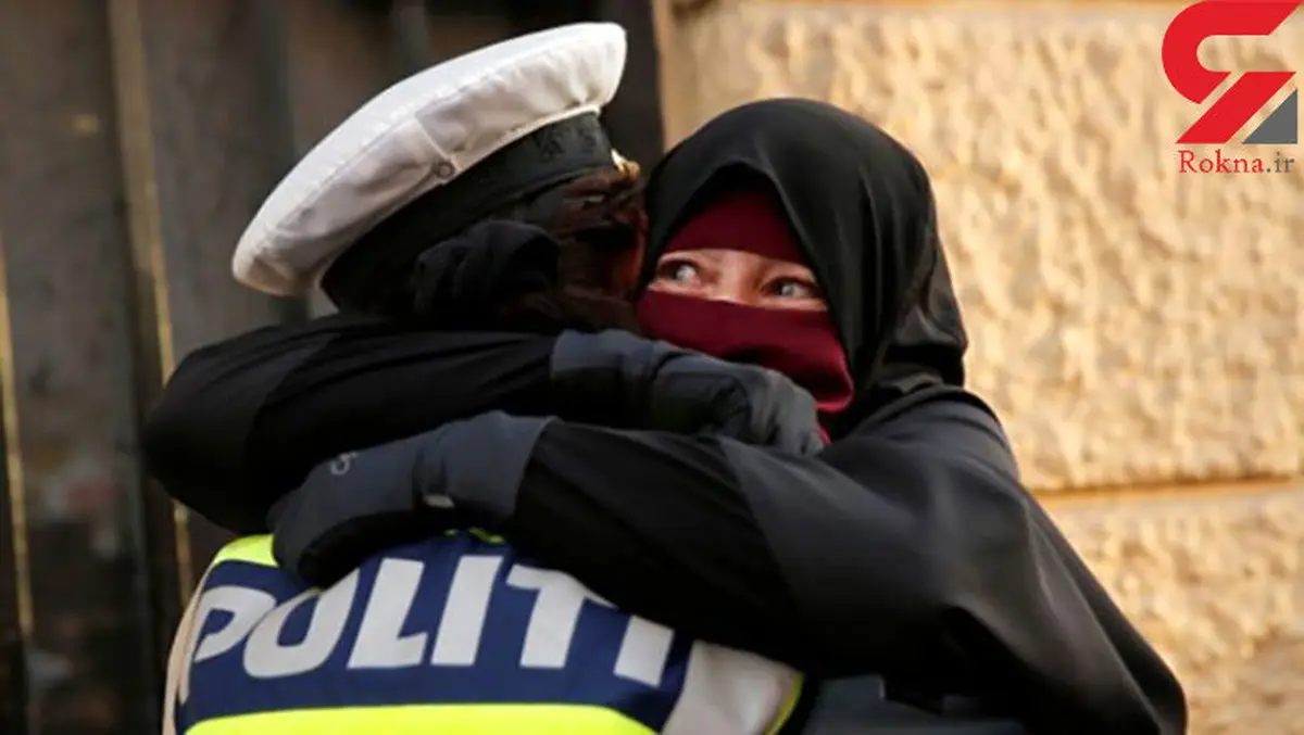 زن باحجاب از ترس مامور پلیس را در آغوش کشید + عکس