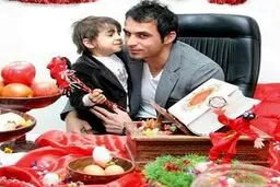 هادی نوروزی و پسرش سر سفره هفت سین/ عکس