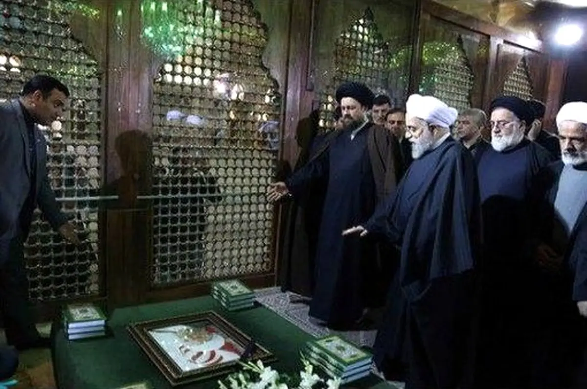 روحانی و سیدحسن خمینی بر سرمزار آیت‌الله هاشمی/عکس