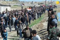 تصاویر اندوهناک از تشییع پیکر ۷ عضو خانواده کشته شده به دست داعش