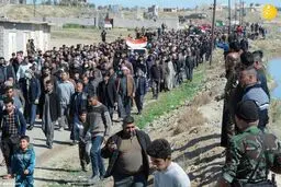تصاویر اندوهناک از تشییع پیکر ۷ عضو خانواده کشته شده به دست داعش