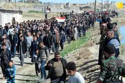تصاویر اندوهناک از تشییع پیکر ۷ عضو خانواده کشته شده به دست داعش