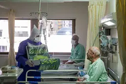 خادمان امام رضا (ع) در بخش کرونای بیمارستان میلاد + عکس