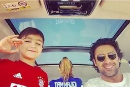 پسر فرهاد مجیدی به خاطر هادی نوروزی قرمز پوشید/عکس