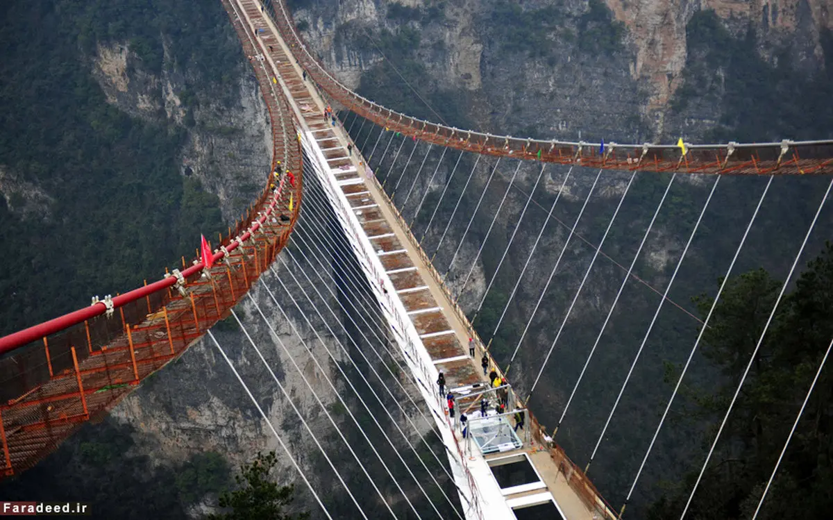 تصاویر/ مراحل ساخت طولانی‌ترین پل شیشه‌ای جهان