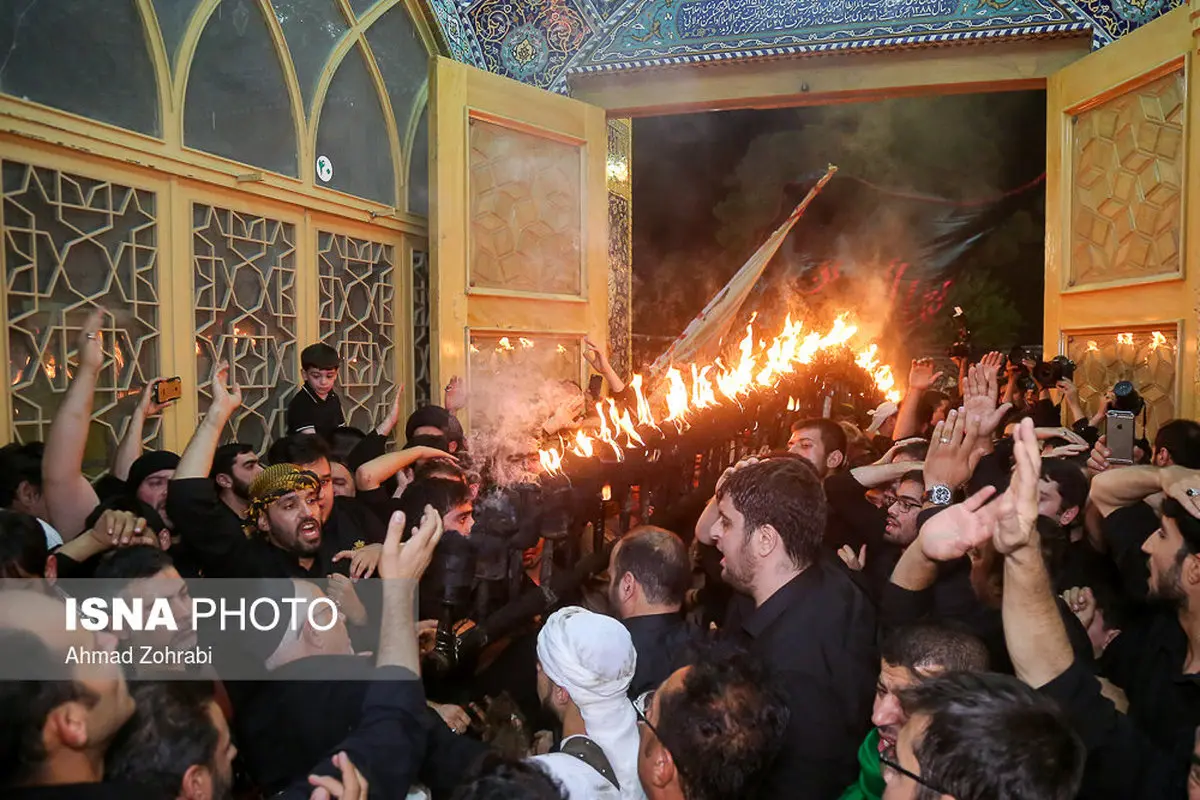 تصاویری از مراسم سنتی مشعل گردانی در قم