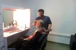 رئیس سازمان انرژی اتمی در اتاق گریم/عکس