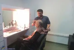 رئیس سازمان انرژی اتمی در اتاق گریم/عکس
