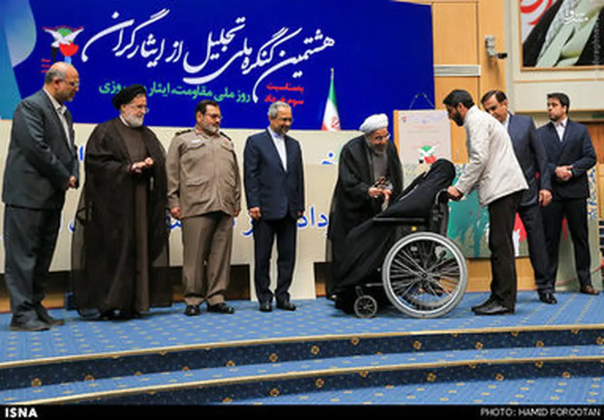 تجلیل از ایثارگران با حضور دکتر روحانی به روایت تصویر